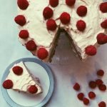 grain free raspberry-infused cake with raspberry jam and honey meringue frosting