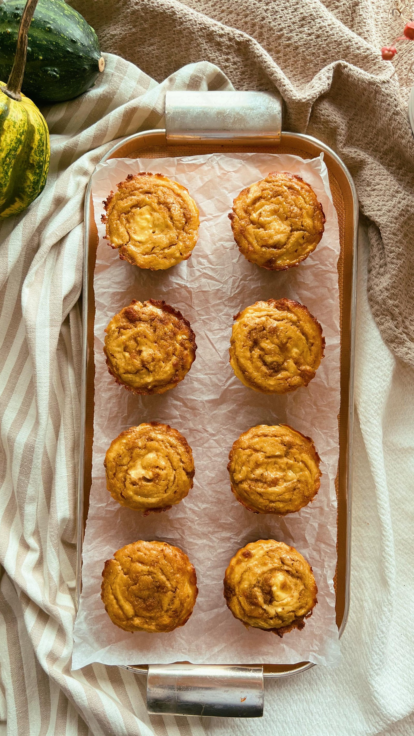 these fall-ready muffins are made w coconut flour, pumpkin puree, eggs, sweetened with honey, and a handful of spices, with a “cheesecake” swirl on top that’s made w dry curd cottage cheese or yogurt. comment “recipe” and ill dm it to you or grab it at @grainfreee link in bio! and happy canadian thxgiving yall 🦃🤗🫶