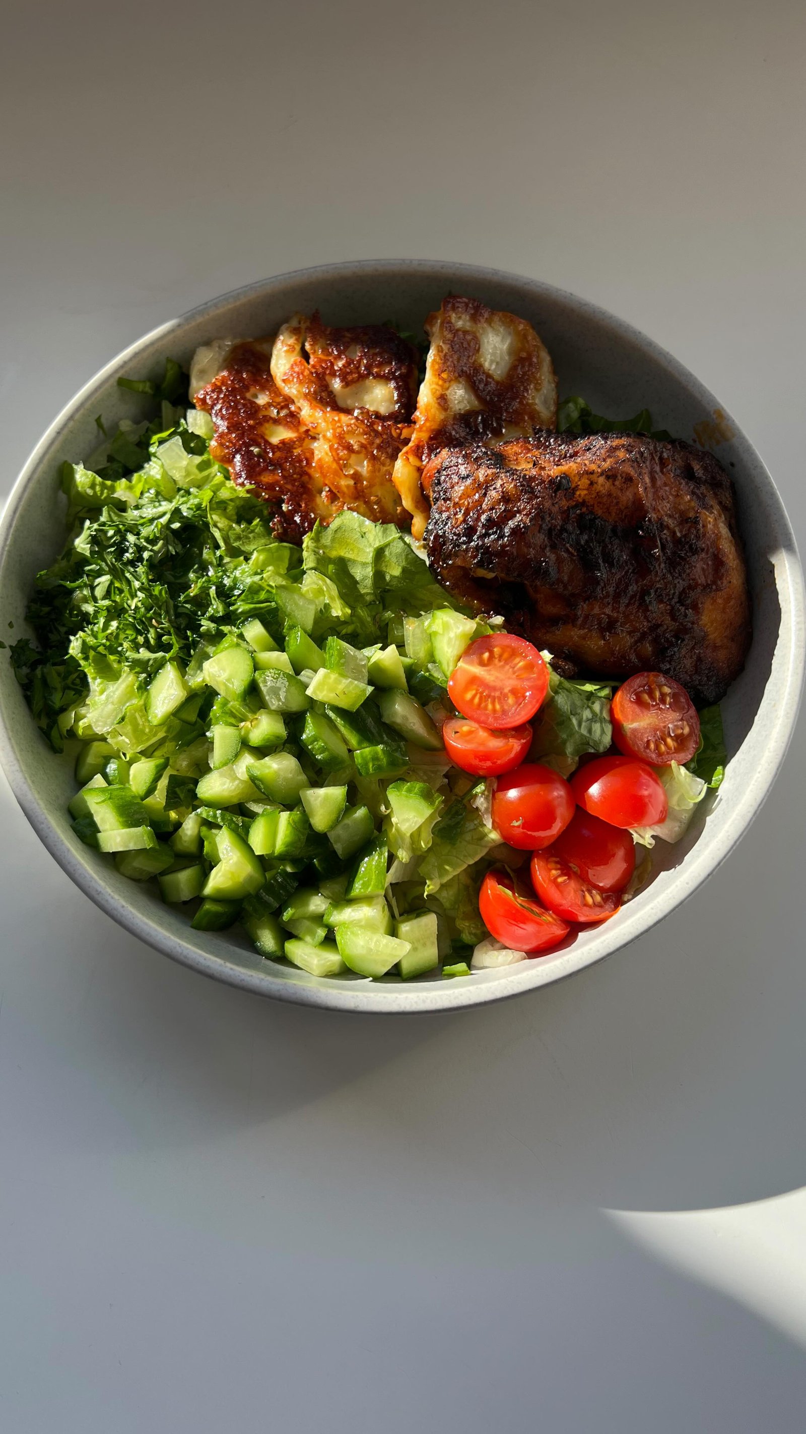 when you make a salad sometimes you just gotta go with god aka whatever is in your fridge that day, and leftovers can often be repurposed for a delicious salad, especially whatever protein you had the night before, in this case, chicken. i reheat it in the oven cuz i like to keep it extra crispy (also i don’t actually have a microwave atm so), and i didn’t do much in the way of extra veggies because the⭐️ star ⭐️of the show was really the fried halloumi, which i just sliced and fried in extra virgin olive oil. i would usually add a touch of honey too but i was sharing w my 9 month old, and she also really enjoyed it 🤷‍♀️👶🥗

the salad dressing is something i tend to eyeball so i will have to work on real measurements one day, but this one consisted of one lemon juiced, extra virgin olive oil (about the same amount if not slightly more than the lemon juice), a drizzle of honey (like a tbsp) salt, pepper and oregano🤌 you can also add a splash of apple cider vinegar or white wine vinegar (like a tbsp). 

ALSO can i just say the lighting was cooperating with me for this one, it is all natural light and it is amazing 😌hence it was changing as i shot the video ✨

yesterdays salad linked in the reel below📹⬇️ follow @earth.to.rose  for more!

#saladideas #saladbowl